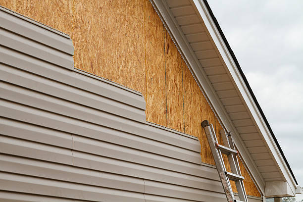 Professional Siding Replacement technician working in Tiltonsville, OH